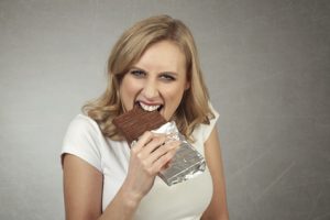 women eating chocolate